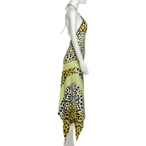 Detail of backless halter maxi dress featuring leopard print and irregular handkerchief hem