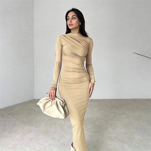 Detail showing the ruched texture of khaki bodycon long-sleeved midi dress