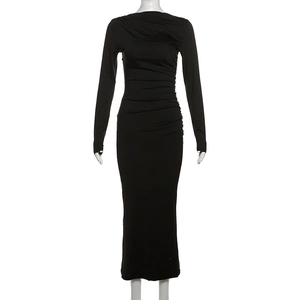 Detail shot of black long sleeve bodycon dress with ruching textures and slim fit fabric