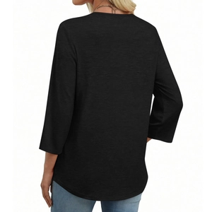 Back view of a casual black 3/4 sleeve V-neck top with a curved hem on a model