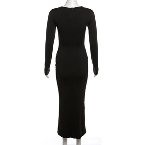 Back view of slim fit black long sleeve dress featuring hidden zipper and knit fabric