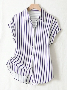 Detailed view of women's short sleeve striped shirt with collar and white buttons