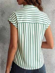 Detailed back view showing the green and white striped pattern on a short-sleeved shirt