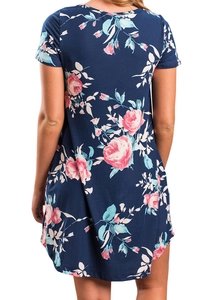 Rear view of short sleeve A-line dress with navy floral print and round neckline