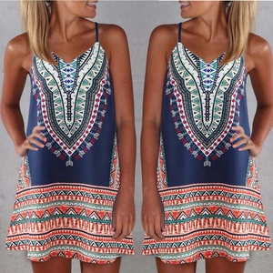 Detail of bohemian summer mini dress with tribal print and v-neck strap design