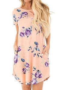 Close-up of pink floral dress featuring purple rose prints and functional side pockets