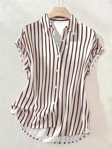 Detail of white striped short sleeve shirt with vertical brown lines and button closure