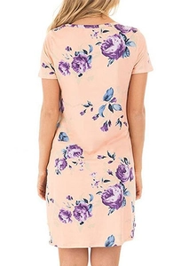 Detailed back view of short sleeve dress featuring purple floral prints on peach fabric