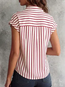 Detail view of red and white striped shirt with back yoke and curved hemline
