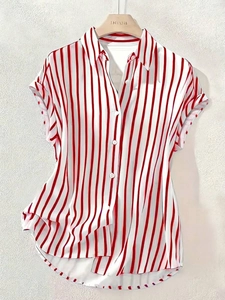 Detailed view of red and white striped short sleeve shirt with white buttons and classic collar