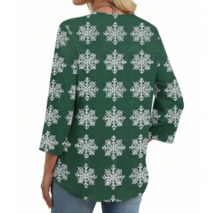 Vista posteriore del top verde scuro da donna con stampa a fiocchi e bordo curvo