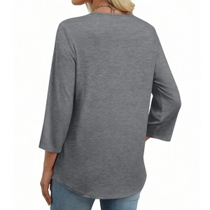 Rear view of a casual dark grey knit top featuring three-quarter sleeves and a curved hem