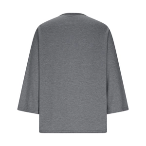 Detailed back view of heather grey V-neck top showing soft knit texture and loose fit