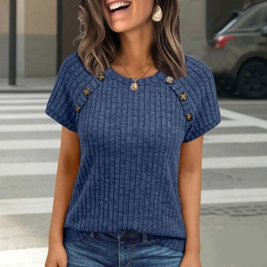 Close-up of blue ribbed knit T-shirt featuring decorative buttons on shoulders