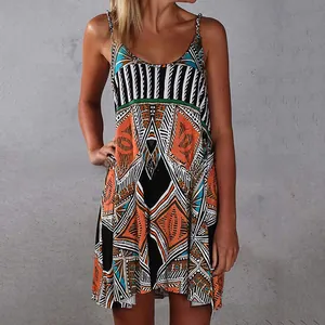 Close-up of summer strap dress featuring geometric tribal patterns and A-line cut