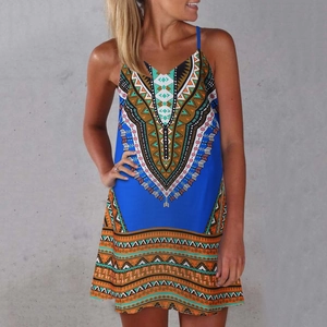 Detail of bohemian digital print fabric and tribal patterns on a blue summer slip dress