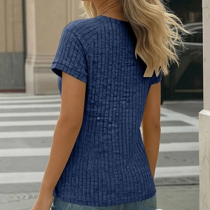 Back view of a slim fit navy blue short sleeve knit t-shirt with ribbed texture details