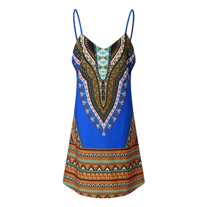 Close-up of bohemian geometric print on blue A-line slip dress with fine straps