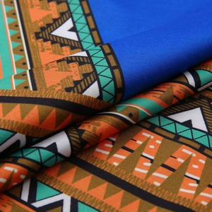 Macro view of the digital ethnic print fabric with detailed weave and vibrant colors