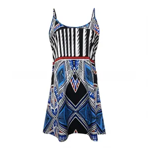 Detail of bohemian geometric print on a blue and white summer strap dress