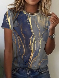 Detail of blue and gold marble print on women's slim fit short sleeve crew neck T-shirt