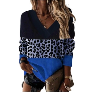 Women's V-neck long sleeve top featuring black leopard print and blue color block design