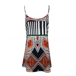 Detailed view of women's summer slip dress with ethnic geometric and striped patterns