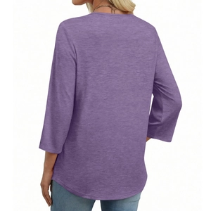 Back view of lavender purple three-quarter sleeve top with curved hem and knit texture