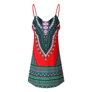 Detail of red summer dress featuring tribal geometric patterns and ethnic print layout