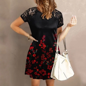 Close-up of black lace hollow sleeves and red floral print on the summer A-line dress