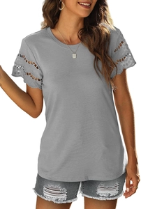 Close-up of grey t-shirt featuring intricate lace hollow-out details on the short sleeves