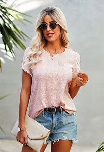 Detail of elegant polka dot t-shirt with delicate lace hollow out sleeves for women
