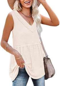 Close-up of beige V-neck tank top featuring textured waffle knit and peplum babydoll hem