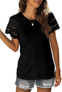 Detail of delicate eyelet lace stitching and scallop edge on black short sleeve T-shirt