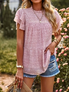 Detail of pink leopard print chiffon top with ruffled collar and layered cap sleeves