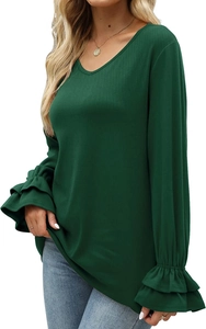 Close-up of long sleeve V-neck ribbed knit top in dark green with tiered flare cuffs