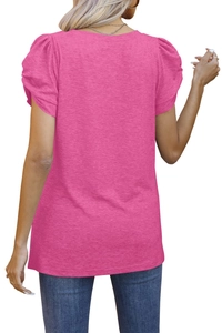 Detail view of the rose pink short sleeve T-shirt with bubble sleeves and knit texture