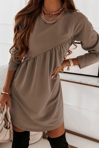 Detail of taupe long sleeve dress featuring asymmetrical ruffles and soft knit texture
