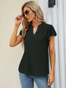 Detail of V-neck black jacquard T-shirt with ruffle sleeves and textured lace fabric