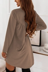 Detailed back view of a brown long sleeve dress with unique asymmetrical stitching detail