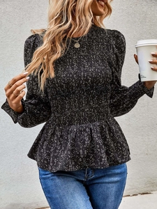 Detail of smocking waist design and peplum hem on floral print long sleeve blouse