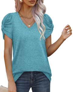 Close-up of light blue V-neck top showing puff sleeves and ruched cuff details on model