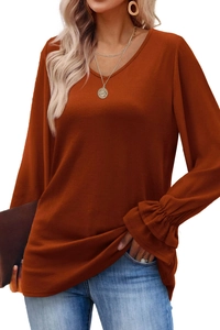 Detail of rust red V-neck top with pleated bell sleeves and soft knitted texture