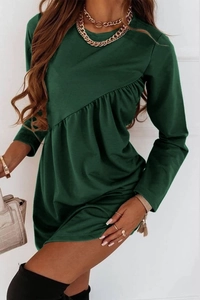 Detailed view of the dark green long sleeve dress with unique irregular ruched chest design