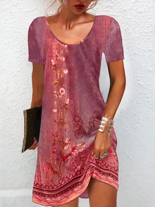 Detail of vintage pink floral print short sleeve dress with bohemian hem pattern