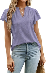 Close-up of lavender V-neck top featuring geometric floral eyelet embroidery and ruffle trim