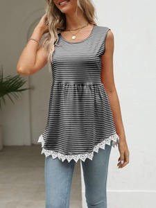 Detail of summer striped tank top with waist drawstring and floral lace hem detail