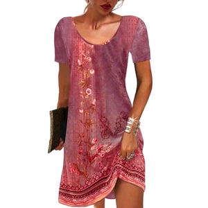 Detailed view of floral print pattern on a pink short sleeve summer dress