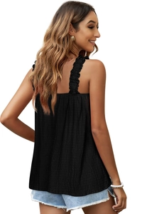 Detail of ruffle straps and ribbed fabric texture on a black sleeveless summer top