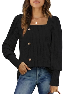 Close-up of black square neck long sleeve top with textured knit and amber buttons